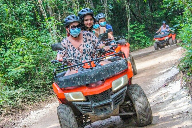 Adrenaline Tour with ATV, Ziplines and Cenote from Cancun - ATV riding on the jungle trail
