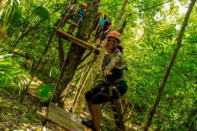Amazing ATV Tour, Ziplines and Cenote Swim with Lunch and round trip included - Swimming in a cenote with a choice of entry