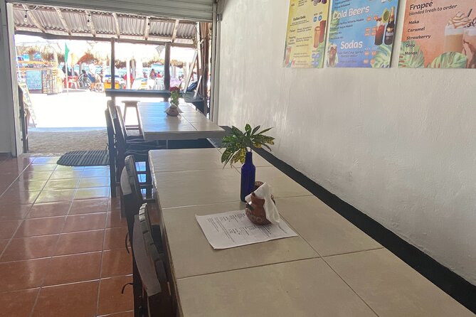 Authentic Beachfront Mexican Cooking Class Cafe Jaguar Costa Maya - Pressing tortillas on a wooden comal setup