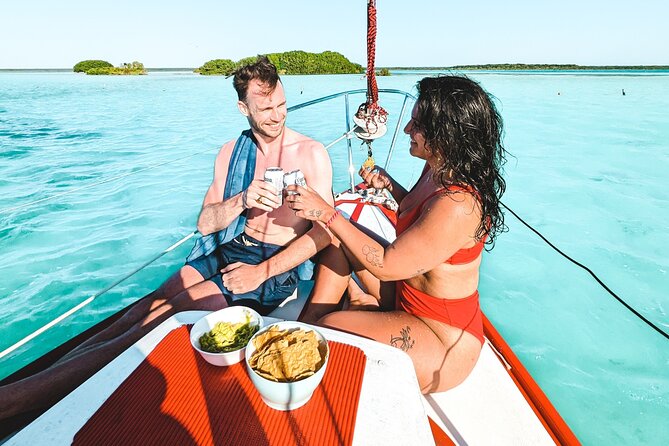 Bacalar: 4hr Private Sailing Tour with Guacamole & Drinks - Cenote Negro and the changing colors of the lagoon