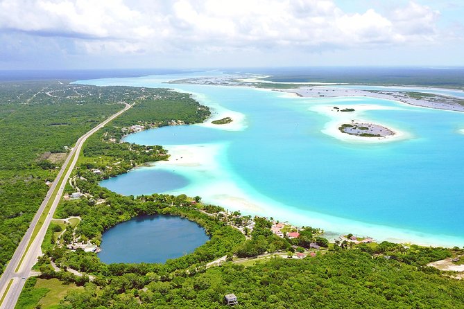 Bacalar – 7 Colors Lagoon Excursión Costa Maya - Swimming, fruit, drinks, and a relaxed boat atmosphere