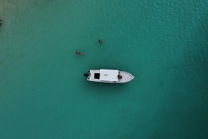 Bacalar Boat Tour and Visit to Cenotes - Fruit, hibiscus drinks, and three beers per adult
