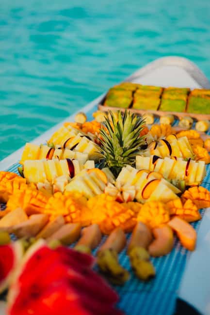 Bacalar Lagoon Sailing Tour with Open Bar and Mexican Lunch - Swimming in the colorful cenotes