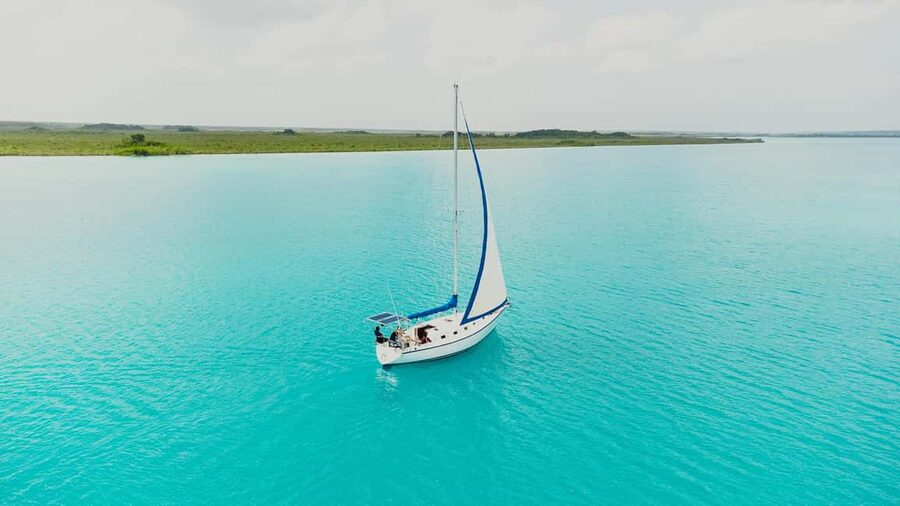 Bacalar Lagoon Sailing Tour with Open Bar and Mexican Lunch - How the crew shapes the day