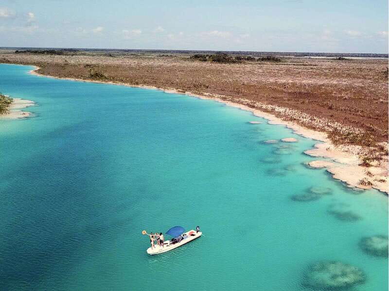 Bacalar: Magnificent Bacalar Lagoon Exclusive Boat Tour - The three cenotes: Black, Emerald, and Cocalitos