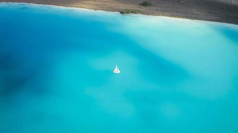 Bacalar: Private Sailboat Tour with Lagoon Swimming - The abandoned hotel and the shallow blue water