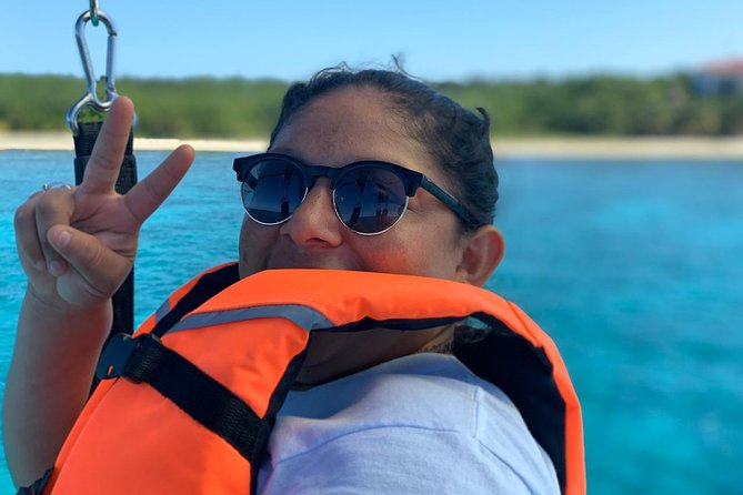 Best Parasailing Cozumel + Locker - Returning to the Boat and Beach Club