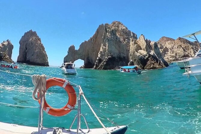 Cabo Blue Snorkeling Cruise, Open Bar and Lunch in Cabo San Lucas - Food, music, and the boat’s social mood