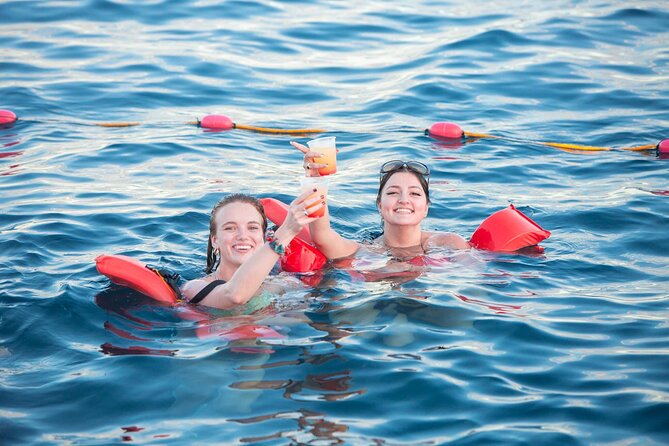 Cabo San Lucas Boat Tour with Snorkeling, Open Bar, and Lunch - Sun, shade, and comfort on board