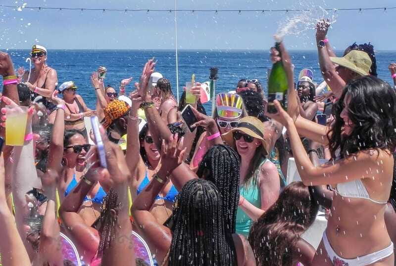 Cabo San Lucas: Hip Hop Boat Party with Unlimited Drinks - The champagne shower ends the ride with a splash