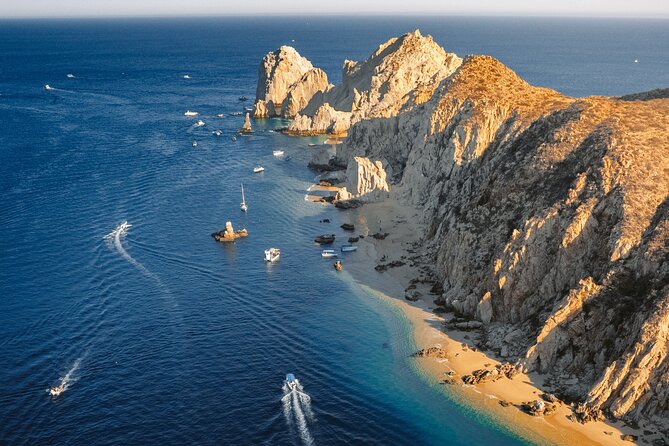 Cabo San Lucas Sunset Cruise with Open Bar and Snacks - A sunset cruise built around Cabo’s big coastal sights