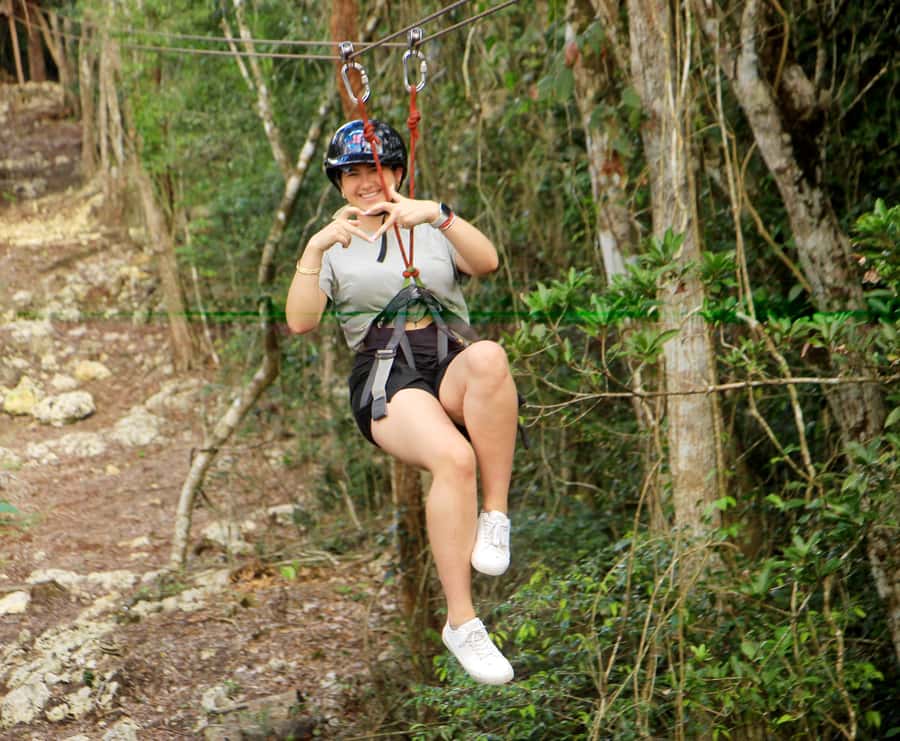 Cancún: ATV, Zipline, and Cenote Adventure with Lunch - Ziplining above the trees