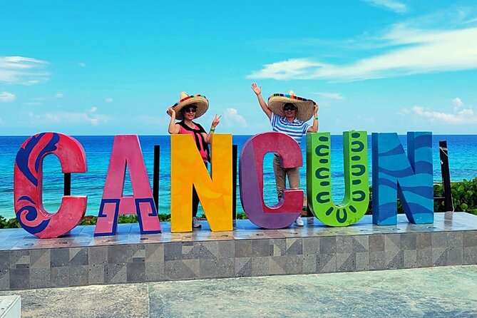Cancun City Sightseeing and Shopping Tour on a Double Decker bus - Avenida Tulum and the view beyond the resorts