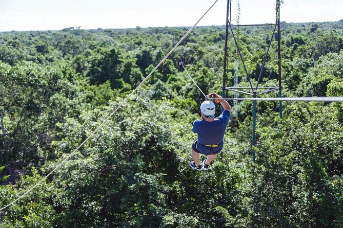 Cancun Extreme Zipline Canopy Tour - Getting harnessed for the 2-mile zipline course