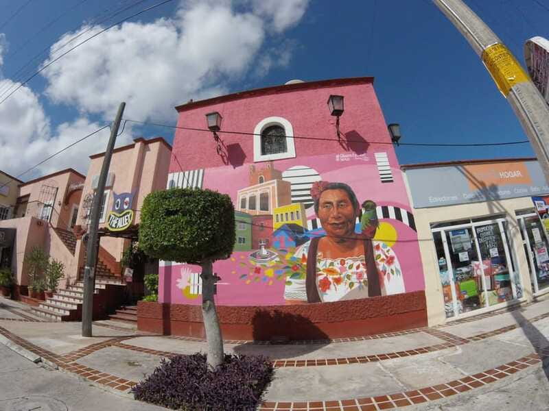 Cancun: Guided City Tour with Shopping by Double Decker Bus - Boulevard Kukulcan from a panoramic bus