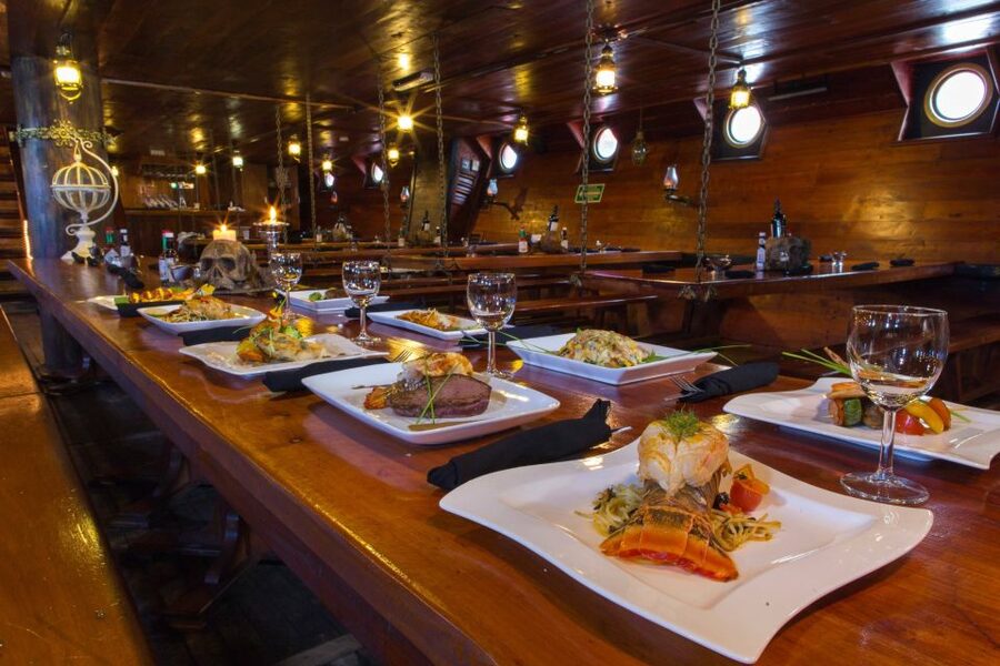 Cancún: Jolly Roger Pirate Dinner Cruise 2025 - Dinner, open bar, and what the $65 price covers