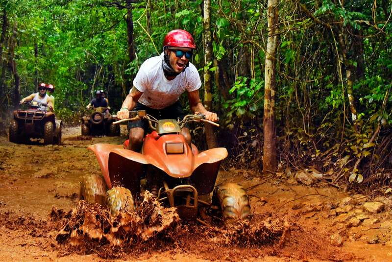 Cancun: Jungle ATV Tour, Ziplining, and Cenote Swim - Three ziplines over the tree tops