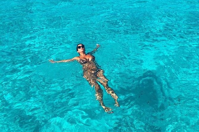 Cancun Sailing Catamaran Islas Mujeres With Luxury Beach Club - Beach club time, lunch, and a calm swim