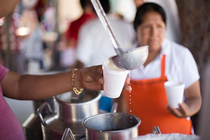 Cancun Street Food Tour with Food Stalls, Local Market and Murals - Guides, vehicles, and the feel of the outing