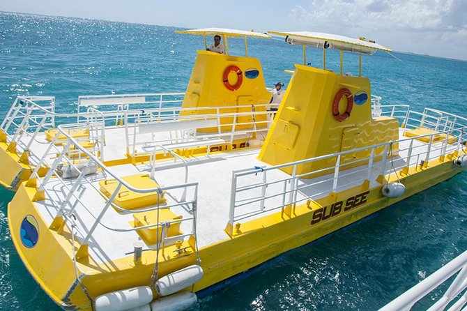 Cancun Submarine and Optional Snorkeling Tour - The guides, narration, and onboard atmosphere