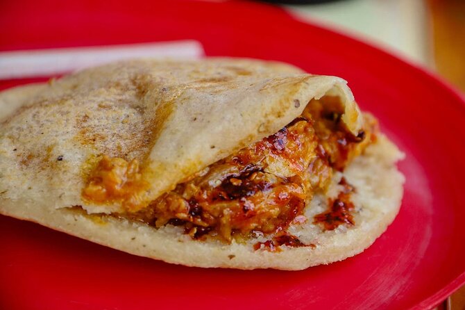 Cancun Walking Food Tour: Local Food, Markets, and Street Art. - Avenida Sunyaxchen and the case for carnitas