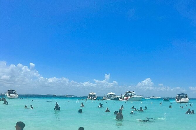 Catamaran Cancun to Isla mujeres Lunch OpenBar and Snorkeling - Music, dancing, and the open-bar atmosphere