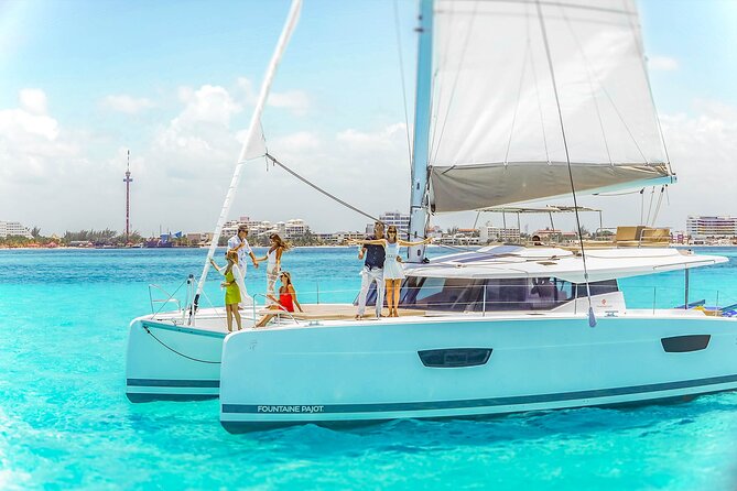 Catamaran to Isla Mujeres Snorkeling Tour with Open Bar and Lunch - The return sail and sunset views