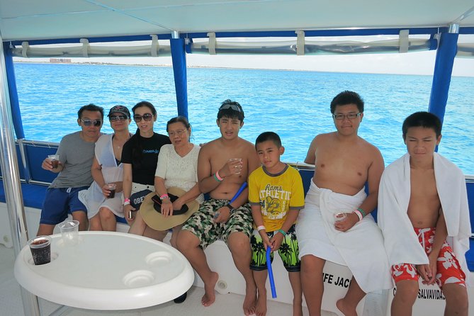 Catamaran Tour to Isla Mujeres all Included - Food, drinks, music, and the social mood