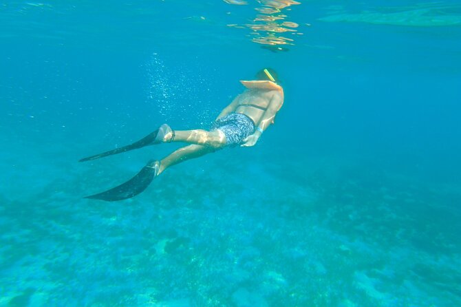 Dancer Cruise Isla Mujeres Snorkel Food and Drinks Included - The ride back is the main party