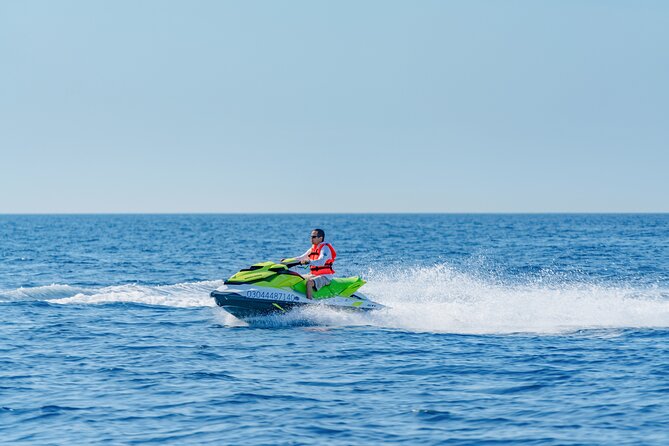 Double Jet Ski and Boat Ride in The Sea of Cortez Guided Tour - Boarding the double jet ski in the Sea of Cortez