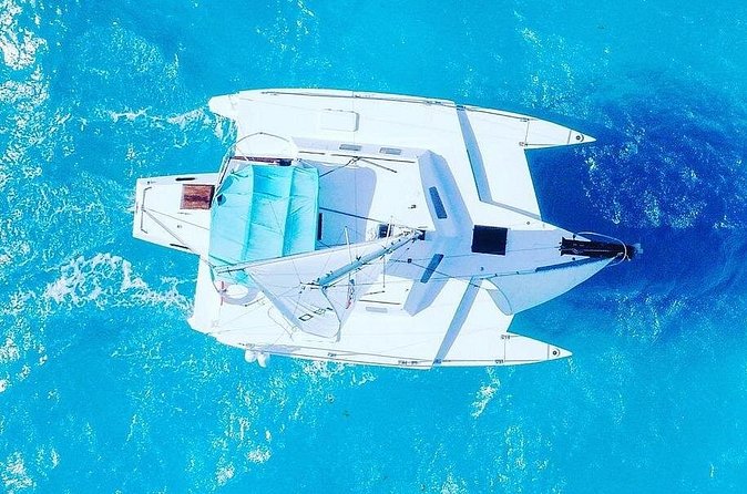 Exciting Catamaran Tour to Isla Mujeres, from Cancún! - Spinnaker flying and the water activities