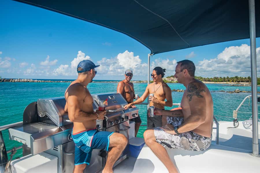 From Puerto Aventuras: Share Catamaran Tour - A grilled lunch at sea