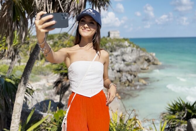 Full Day Tour to Tulum Cenote and Swim with Turtles in Akumal - Tulum’s ruins above the Caribbean