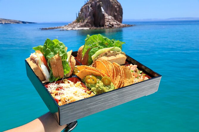 Half Day Cabo Snorkel Adventure with Lunch and Open Bar - Lunch, open bar, and the social mood