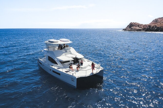 Half Day Cabo Snorkel Adventure with Lunch and Open Bar - Boarding the catamaran in Cabo San Lucas