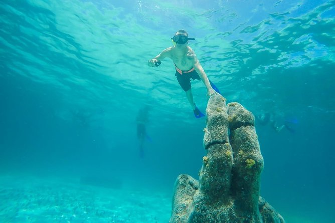 Half Day Sailing Private Catamaran to Isla Mujeres - Pickup, timing, and practical details