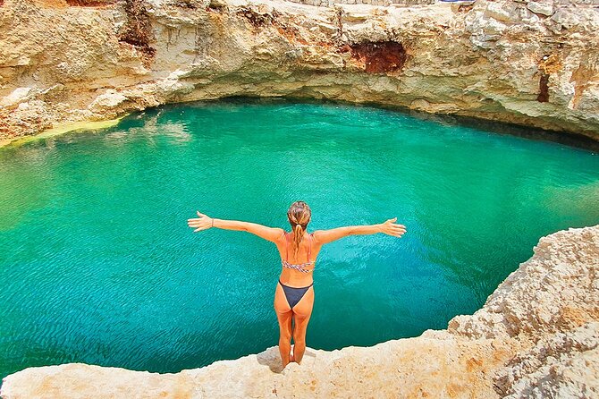 Hidden Cenote Swim & ATV Jungle Adventure with Transportation - Cooling off in the open-air cenote