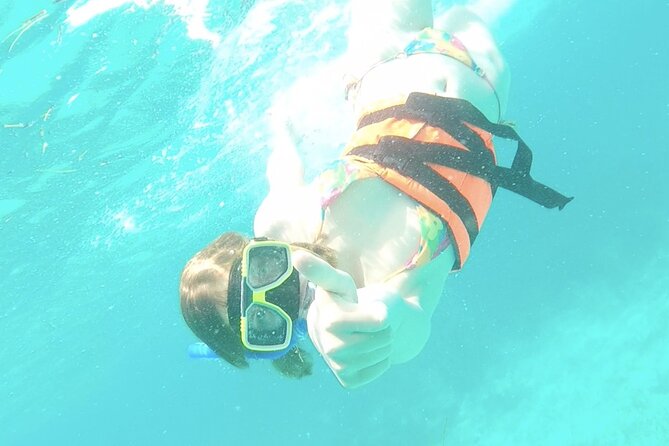Isla Mujeres Catamaran Tour from Cancun with Snorkel and Open Bar - Isla Mujeres in a 1.5-Hour Window