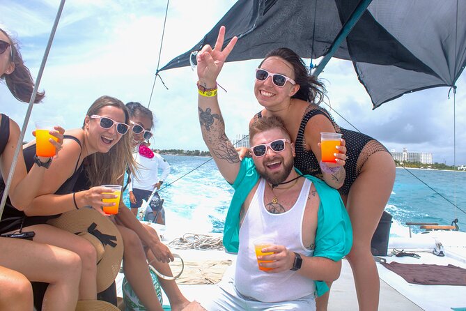 Isla Mujeres Catamaran Tour from Cancun with Snorkel and Open Bar - The Crew, Entertainment, and Overall Mood