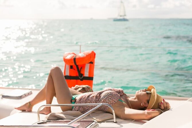 Isla Mujeres Catamaran Tour with Snorkel, Open bar and Transport - Sailing across the Mexican Caribbean