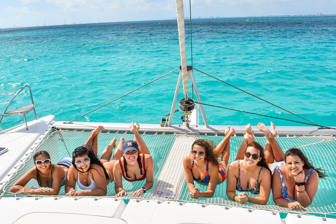 Isla Mujeres Catamaran Tour with Snorkel, Open bar and Transport - Booking advice and cancellation terms
