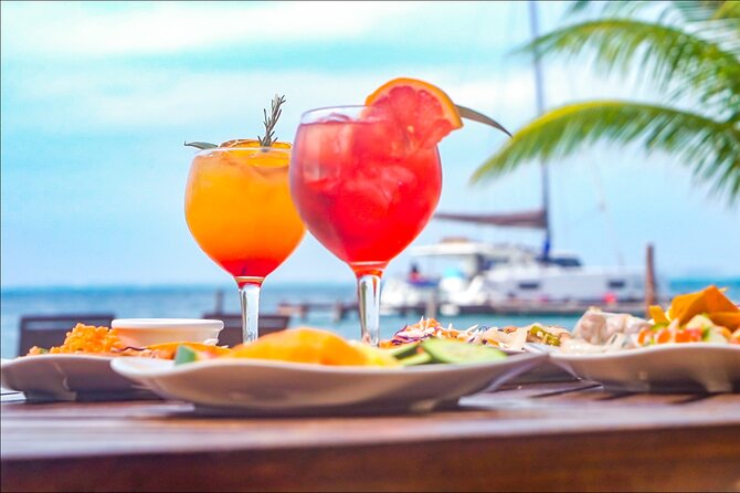 Isla Mujeres Cruise with Beach Club, Snorkel, Lunch and Open Bar - El Meco reef: colorful fish, short sessions, and open-water limits