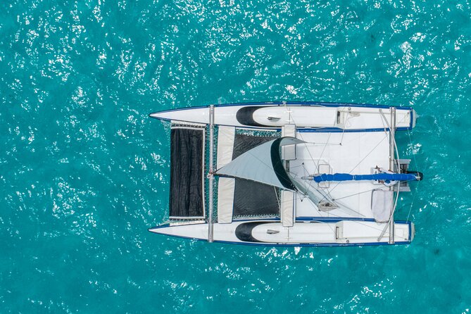 Isla Mujeres Premium Tour in Private Catamaran with Lunch - Lunch at Club Playa Mexico