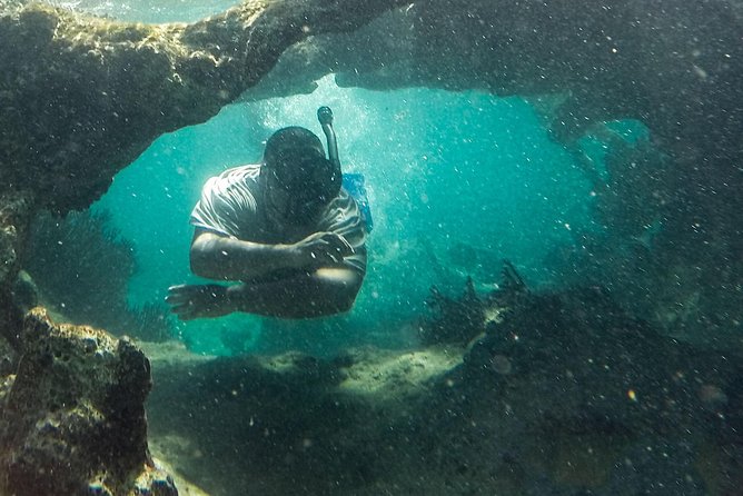 Isla Mujeres Snorkeling Tour Adventure - Stop one: shallow water near Lighthouse Reef