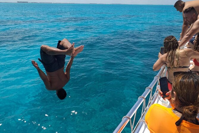 Isla Mujeres Tour with Open Bar Food and Snorkeling - Meeting at Coco Bongo and getting aboard