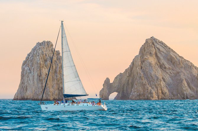 Los Cabos Luxury Sunset Sail with Light Appetizers and Open Bar - El Arco at golden hour