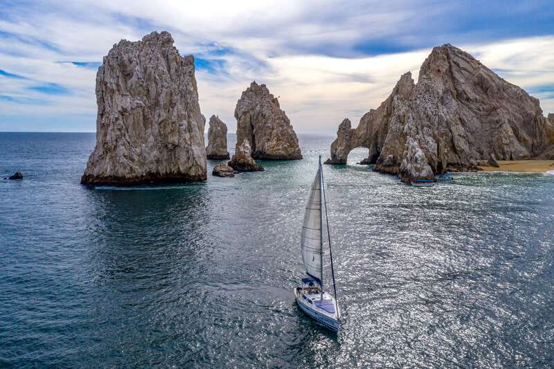 Los Cabos: Shared Sunset Sailing Cruise - Sunset timing, music, and the final return