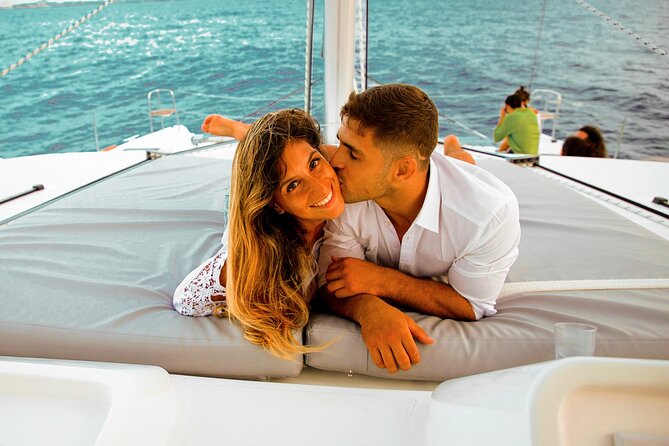 Luxury Sunset Sailing Cruise in Cancun with Light Dinner and Open Bar - Boarding the catamaran and settling in