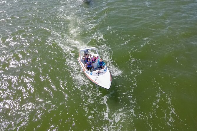 Mangrove and Lagoon Speed Boat Tour - Taking the wheel at Nichupte Lagoon