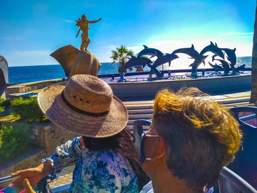 Mazatlán: Double-Decker Bus, Cliff Diving & Walking Tour - Playa Norte and the small bird-feeding moment